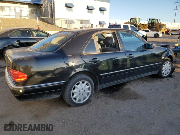 1999 Mercedes-Benz E-Class with VIN WDBJF82H9XX026911, listed as a Copart auction lot 48808835 with 205,953 mi miles and Salvage Title. Bid and sale history available at carsss.com. Image 3.