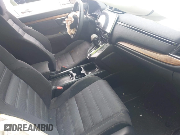 2019 Honda CR-V EX с VIN 2HKRW1H5XKH512978, выставлен на аукционе IAAI как лот 42075371 с пробегом 112 013 миль миль и . История ставок и продаж доступна на DreamBid. Изображение 5.