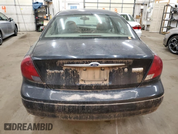2003 Ford Taurus SEL Deluxe with VIN 1FAHP56S43A219925, listed as a Copart auction lot 76978824 with 191,000 mi miles and Salvage Title. Bid and sale history available at DreamBid. Image 6.