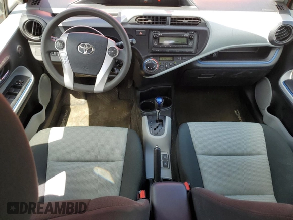 2012 Toyota Prius c One with VIN JTDKDTB35C1030051, listed as a Copart auction lot 52895065 with 94,529 mi miles and Salvage Title. Bid and sale history available at carsss.com. Image 8.