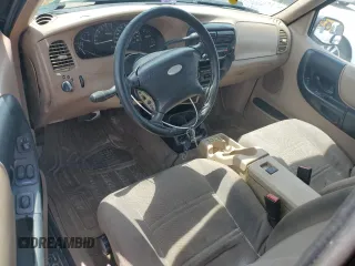 2002 Ford Ranger XLT Appearance with VIN 1FTYR44E42TA32828, listed as a Copart auction lot 60205715 with 290,846 mi miles and Salvage title. Bid and sale history available at DreamBid. Image 8.