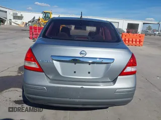 2010 Nissan Versa S with VIN 3N1BC1AP2AL394996, listed as a IAAI auction lot 40690760 with 125,972 mi miles and . Bid and sale history available at DreamBid. Image 17.