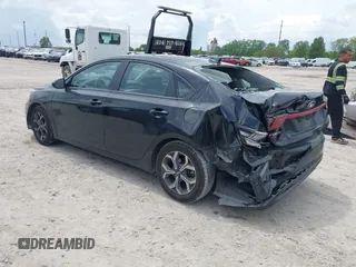 2021 Kia Forte LXS with VIN 3KPF24ADXME297496, listed as a IAAI auction lot 42274152 with 80,345 mi miles and . Bid and sale history available at DreamBid. Image 3.