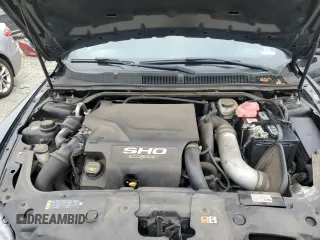 2015 Ford Taurus SHO with VIN 1FAHP2KT2FG188060, listed as a Copart auction lot 48952155 with 93,092 mi miles and Salvage Title. Bid and sale history available at DreamBid. Image 11.