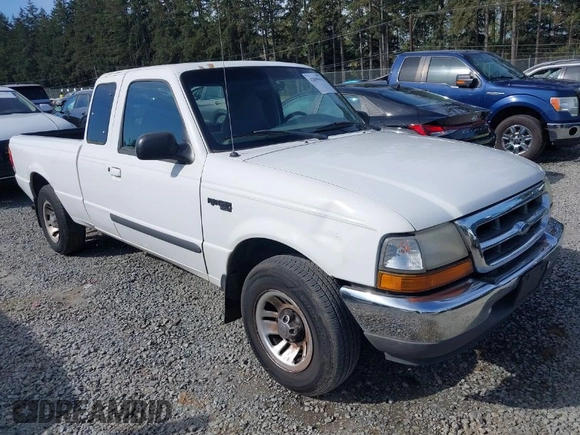 1999 Ford Ranger XLT with VIN 1FTYR14X0XPA65325, listed as a IAAI auction lot 42009611 with 218,657 mi miles. Bid and sale history available at carsss.com. Image 1.