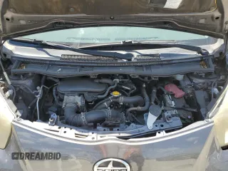 2012 Scion iQ with VIN JTNJJXB06CJ011117, listed as a Copart auction lot 52694345 with 94,547 mi miles and Salvage Title. Bid and sale history available at carsss.com. Image 11.