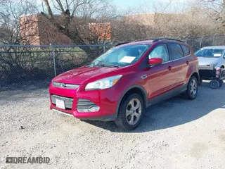 2014 Ford Escape SE with VIN 1FMCU0GX1EUC94976, listed as a IAAI auction lot 41890726 with 119,097 mi miles. Bid and sale history available at carsss.com. Image 2.