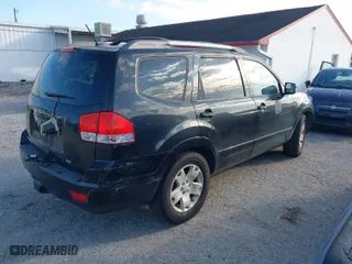 2009 Kia Borrego LX with VIN KNDJJ741295023955, listed as a IAAI auction lot 41605112 with 157,034 mi miles. Bid and sale history available at carsss.com. Image 4.