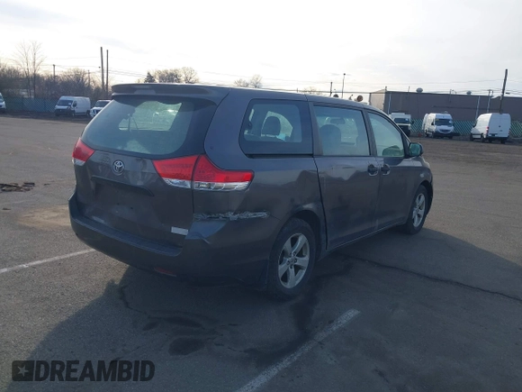 2012 Toyota Sienna with VIN 5TDZK3DCXCS258843, listed as a IAAI auction lot 41700446 with 207,384 mi miles. Bid and sale history available at carsss.com. Image 4.