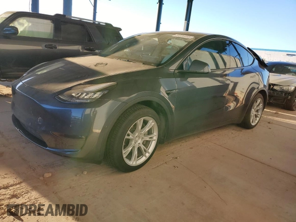 2021 Tesla Model Y Long Range with VIN 5YJYGDEEXMF151557, listed as a Copart auction lot 54936885 with 106,411 mi miles and Salvage Title. Bid and sale history available at DreamBid. Image 1.