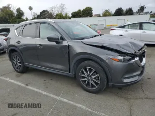 2018 Mazda CX-5 S Premium with VIN JM3KFBDM1J1352233, listed as a Copart auction lot 47082655 with 70,350 mi miles and Salvage Title. Bid and sale history available at DreamBid. Image 4.