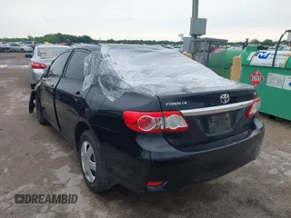 2011 Toyota Corolla L with VIN JTDBU4EE2B9158833, listed as a IAAI auction lot 42120661 with Not Provided miles. Bid and sale history available at carsss.com. Image 3.