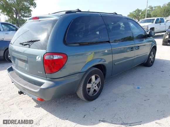 2005 Dodge Caravan SXT with VIN 2D8GP44L55R130702, listed as a IAAI auction lot 42090867 with 232,655 mi miles. Bid and sale history available at carsss.com. Image 4.
