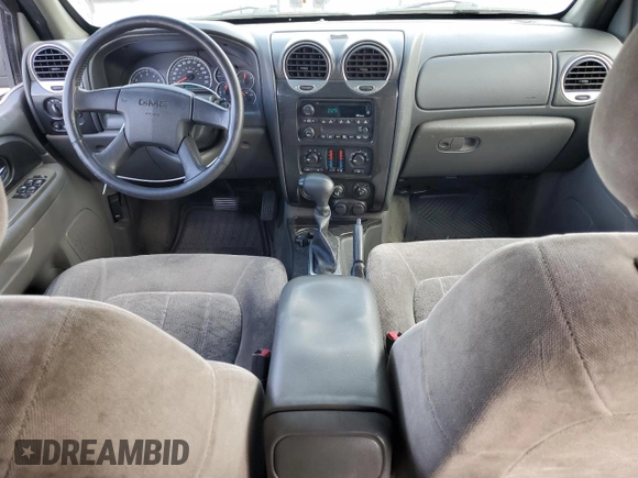 2003 GMC Envoy SLT with VIN 1GKES16SX36220489, listed as a Copart auction lot 71859834 with 148,811 mi miles and Salvage Title. Bid and sale history available at DreamBid. Image 8.