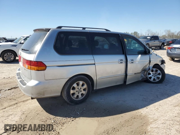 2003 Honda Odyssey EX-L with VIN 5FNRL18903B145567, listed as a Copart auction lot 47925695 with 294,627 mi miles and Salvage Title. Bid and sale history available at DreamBid. Image 3.