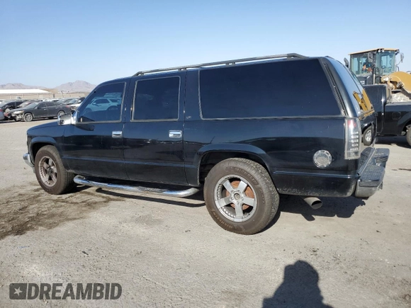 1999 Chevrolet Suburban with VIN 3GNEC16R3XG270099, listed as a Copart auction lot 71041704 with 269,329 mi miles and Salvage Title. Bid and sale history available at carsss.com. Image 2.