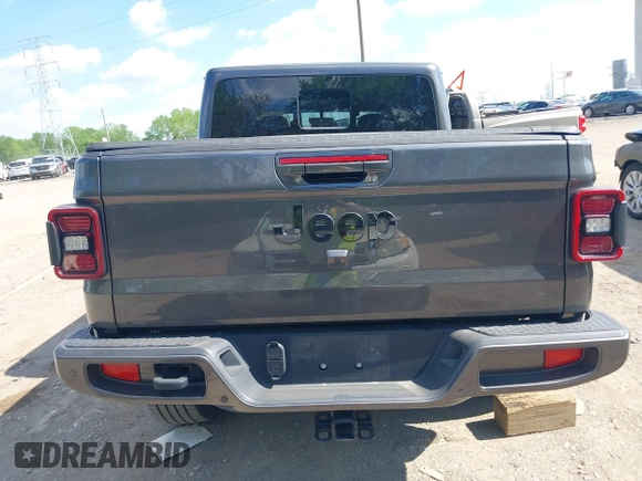 2021 Jeep Gladiator High Altitude z VIN 1C6HJTFG1ML597581, wystawiony jako IAAI lot #42191690 z przebiegiem 47 740 mil mil oraz . Historia ofert i sprzedaży dostępna na DreamBid. Obrazek 16.