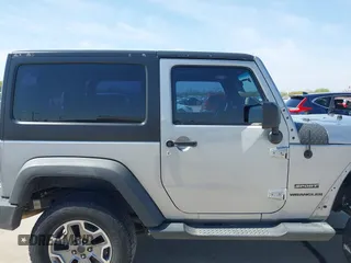 2014 Jeep Wrangler Sport with VIN 1C4AJWAG9EL155409, listed as a IAAI auction lot 41869906 with 102,400 mi miles and . Bid and sale history available at carsss.com. Image 14.