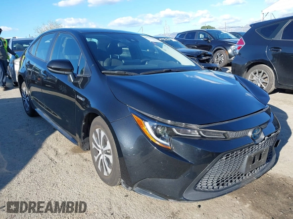 2021 Toyota Corolla Hybrid LE with VIN JTDEAMDE5MJ014959, listed as a IAAI auction lot 41751203 with 26,220 mi miles. Bid and sale history available at carsss.com. Image 1.