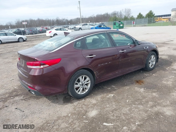 2016 Kia Optima LX with VIN 5XXGT4L36GG108599, listed as a IAAI auction lot 42065639 with 127,387 mi miles. Bid and sale history available at carsss.com. Image 4.