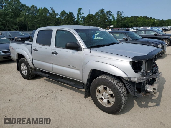 2009 Toyota Tacoma PreRunner with VIN 3TMJU62NX9M082642, listed as a Copart auction lot 57395705 with 160,365 mi miles and Salvage title. Bid and sale history available at DreamBid. Image 4.