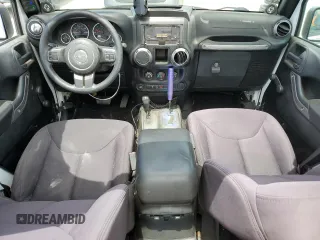 2013 Jeep Wrangler Unlimited Sport with VIN 1C4BJWDG8DL639781, listed as a Copart auction lot 63620025 with 84,720 mi miles and Salvage title. Bid and sale history available at DreamBid. Image 8.