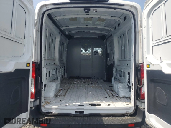 2021 Ford Transit Cargo с VIN 1FTBR1C81MKA80750, выставлен на аукционе Copart как лот 55567135 с пробегом 43 990 миль миль и Чистый • Clean title. История ставок и продаж доступна на DreamBid. Изображение 10.