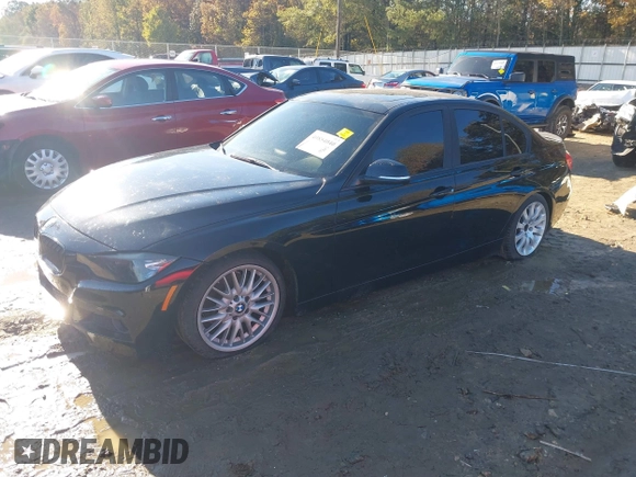 2013 BMW 3 Series 328i with VIN WBA3A5G5XDNP25605, listed as a IAAI auction lot 40854040 with 155,511 mi miles. Bid and sale history available at carsss.com. Image 2.