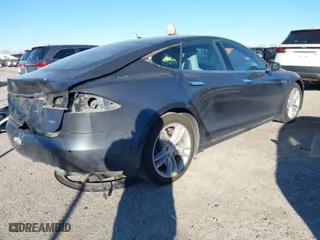 2016 Tesla Model S 90D with VIN 5YJSA1E20GF128496, listed as a IAAI auction lot 41214785 with 126,671 mi miles. Bid and sale history available at carsss.com. Image 4.