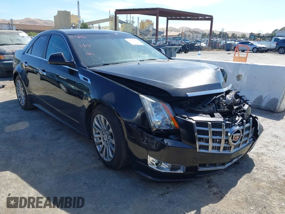 2012 Cadillac CTS Performance z VIN 1G6DJ5E30C0156576, wystawiony jako IAAI lot #42287858 z przebiegiem 106 497 mil mil oraz . Historia ofert i sprzedaży dostępna na DreamBid. Obrazek 1.
