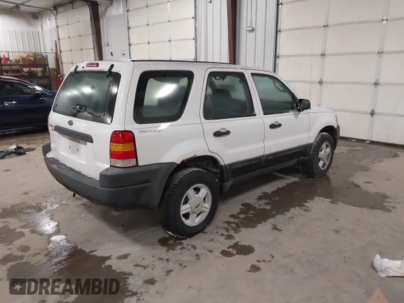 2004 Ford Escape XLS with VIN 1FMYU921X4KA88997, listed as a IAAI auction lot 41520334 with 211,761 mi miles and . Bid and sale history available at DreamBid. Image 4.