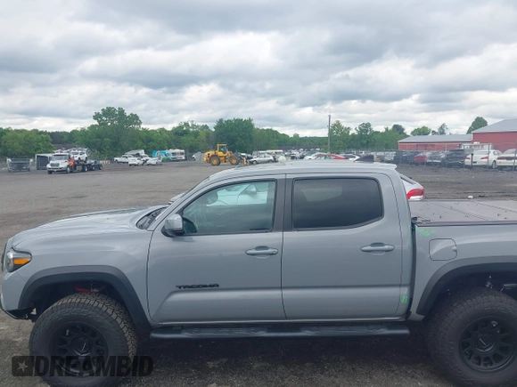 2021 Toyota Tacoma SR with VIN 5TFCZ5AN3MX258746, listed as a IAAI auction lot 42252967 with 62,095 mi miles and . Bid and sale history available at DreamBid. Image 14.