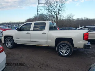 2014 Chevrolet Silverado 1500 High Country with VIN 3GCUKTEC5EG407573, listed as a IAAI auction lot 41651363 with 136,239 mi miles. Bid and sale history available at carsss.com. Image 14.
