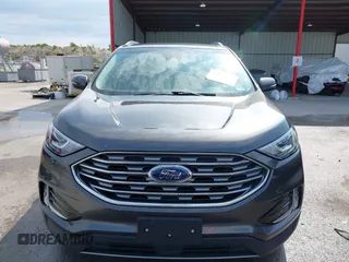 2020 Ford Edge SEL z VIN 2FMPK3J9XLBA54556, wystawiony jako IAAI lot #42179907 z przebiegiem 63 449 mil mil oraz . Historia ofert i sprzedaży dostępna na DreamBid. Obrazek 12.
