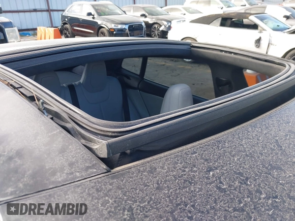 2016 Tesla Model S 90D with VIN 5YJSA1E21GF128460, listed as a IAAI auction lot 40733920 with 89,846 mi miles and . Bid and sale history available at DreamBid. Image 6.