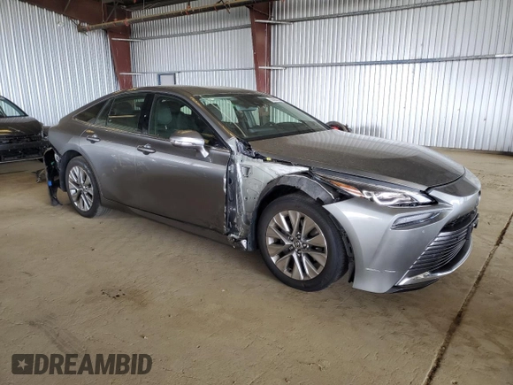 2022 Toyota Mirai XLE with VIN JTDAAAAAXNA007389, listed as a Copart auction lot 58393325 with 27,317 mi miles and Salvage title. Bid and sale history available at DreamBid. Image 4.