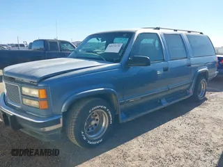 1994 GMC Suburban with VIN 1GKEC16K2RJ721119, listed as a IAAI auction lot 41075175 with 344,904 mi miles. Bid and sale history available at carsss.com. Image 2.