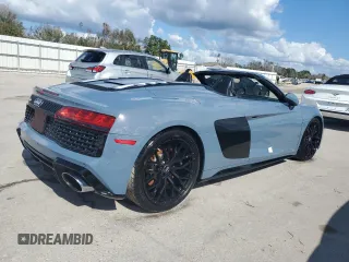 2020 Audi R8 z VIN WUAVECFX5L7901778, wystawiony jako Copart lot #74736714 z przebiegiem Nie podano mil oraz Nie do naprawy. Historia ofert i sprzedaży dostępna na DreamBid. Obrazek 3.
