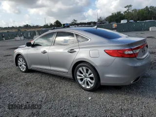 2013 Hyundai Azera z VIN KMHFG4JG3DA209396, wystawiony jako Copart lot #55789595 z przebiegiem 154 665 mil mil oraz Szkoda całkowita • Salvage title. Historia ofert i sprzedaży dostępna na DreamBid. Obrazek 2.