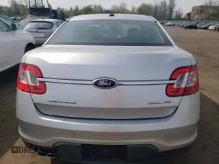 2012 Ford Taurus SEL z VIN 1FAHP2HW4CG129105, wystawiony jako Copart lot #54708445 z przebiegiem 201 450 mil mil oraz Szkoda całkowita • Salvage title. Historia ofert i sprzedaży dostępna na DreamBid. Obrazek 6.