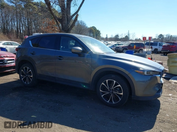 2023 Mazda CX-5 2.5 S Premium Plus Package with VIN JM3KFBEMXP0159401, listed as a IAAI auction lot 41657420 with 28,216 mi miles. Bid and sale history available at carsss.com. Image 13.