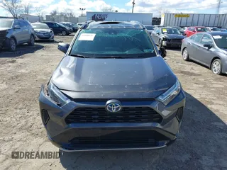 2024 Toyota RAV4 Hybrid SE with VIN 2T3T6RFV0RW051283, listed as a IAAI auction lot 41698931 with 6,465 mi miles and . Bid and sale history available at DreamBid. Image 13.