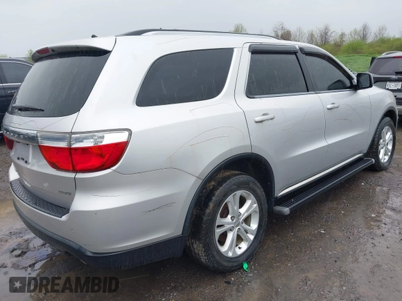 2012 Dodge Durango Crew with VIN 1C4RDJDG0CC322388, listed as a IAAI auction lot 42179814 with 124,009 mi miles and . Bid and sale history available at carsss.com. Image 4.