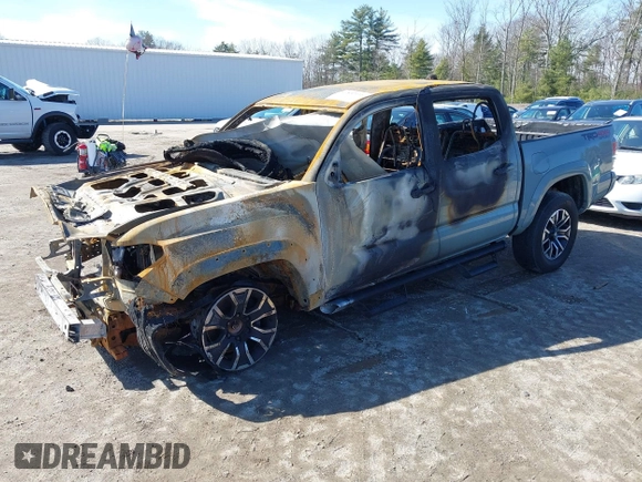 2023 Toyota Tacoma SR z VIN 3TYCZ5AN2PT132764, wystawiony jako IAAI lot #41832334 z przebiegiem 200 000 mil mil oraz . Historia ofert i sprzedaży dostępna na DreamBid. Obrazek 2.