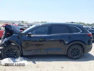 2021 Mazda CX-9 Touring with VIN JM3TCBCY8M0514905, listed as a IAAI auction lot 42385627 with 72,610 mi miles and . Bid and sale history available at DreamBid. Image 14.