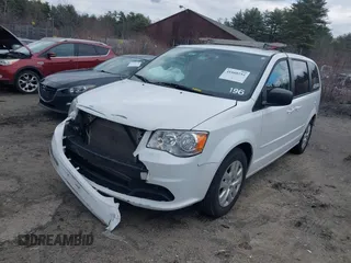 2015 Dodge Grand Caravan SE with VIN 2C4RDGBG2FR714404, listed as a IAAI auction lot 41860254 with 212,599 mi miles and . Bid and sale history available at DreamBid. Image 2.