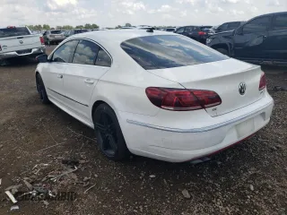 2014 Volkswagen CC R-Line with VIN WVWBN7ANXEE527633, listed as a Copart auction lot 67687694 with 84,561 mi miles and Salvage Title. Bid and sale history available at carsss.com. Image 2.
