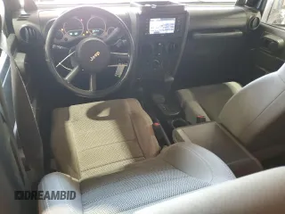 2007 Jeep Wrangler Unlimited Sahara с VIN 1J8GA591X7L217299, выставлен на аукционе Copart как лот 61984395 с пробегом 151 171 миль миль и Списание • Salvage title. История ставок и продаж доступна на DreamBid. Изображение 8.