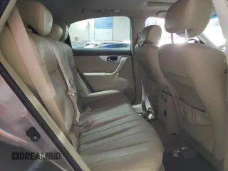 2014 Infiniti QX70 z VIN JN8CS1MW5EM412429, wystawiony jako Copart lot #82933934 z przebiegiem Nie podano mil oraz Szkoda całkowita • Salvage title. Historia ofert i sprzedaży dostępna na DreamBid. Obrazek 10.