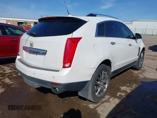 2014 Cadillac SRX Performance Collection with VIN 3GYFNCE31ES646075, listed as a IAAI auction lot 41856378 with 172,379 mi miles. Bid and sale history available at carsss.com. Image 4.